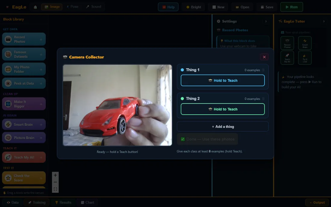 The Camera Collector in Junior: a live webcam view of a toy car beside two classes, each with a Hold to Teach button.